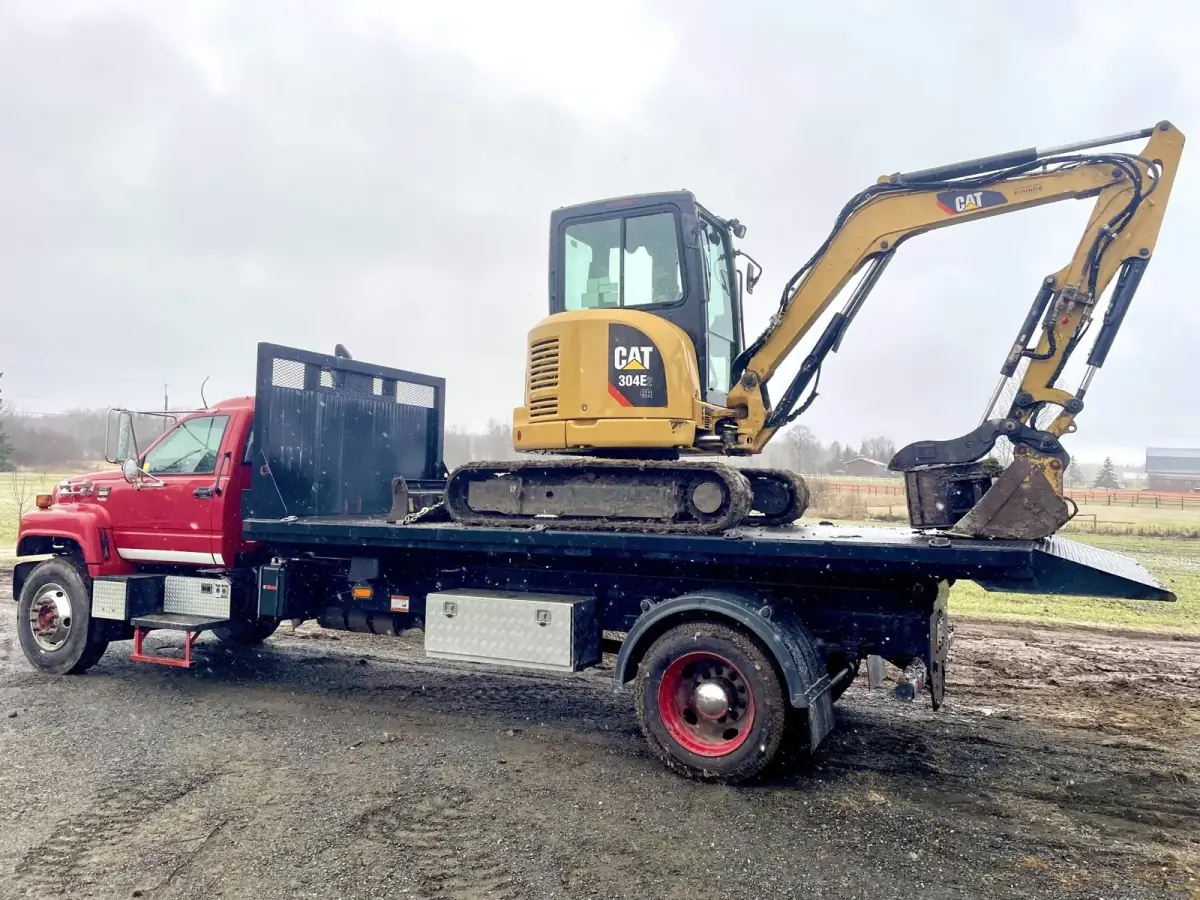 Northern Bin Rentals CAT mini-excavator ready for site work