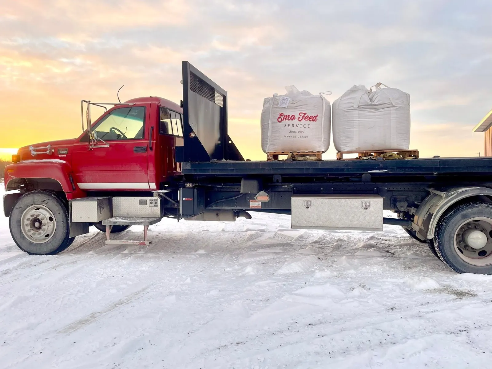 Flatbed truck delivering material